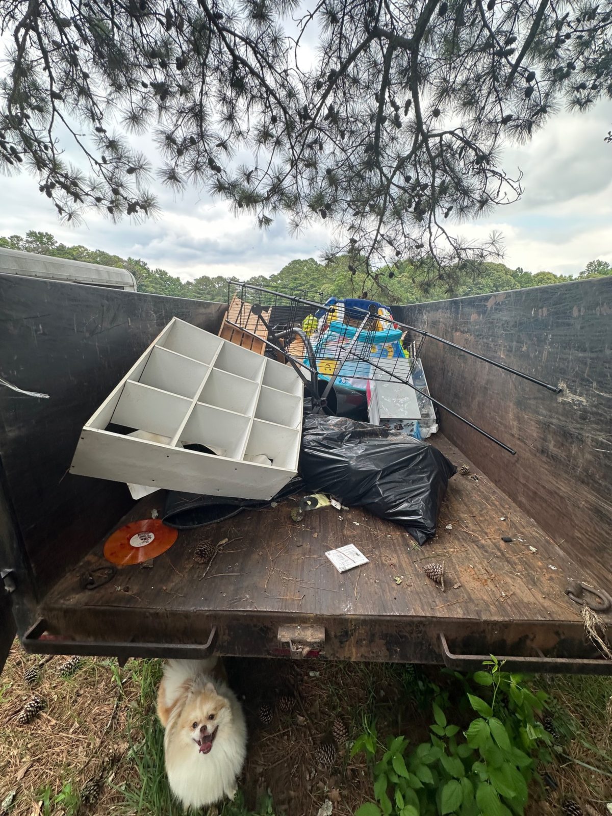 Trailer loaded with household junk